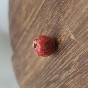 Tiki sunrise patterned‎ bead charm